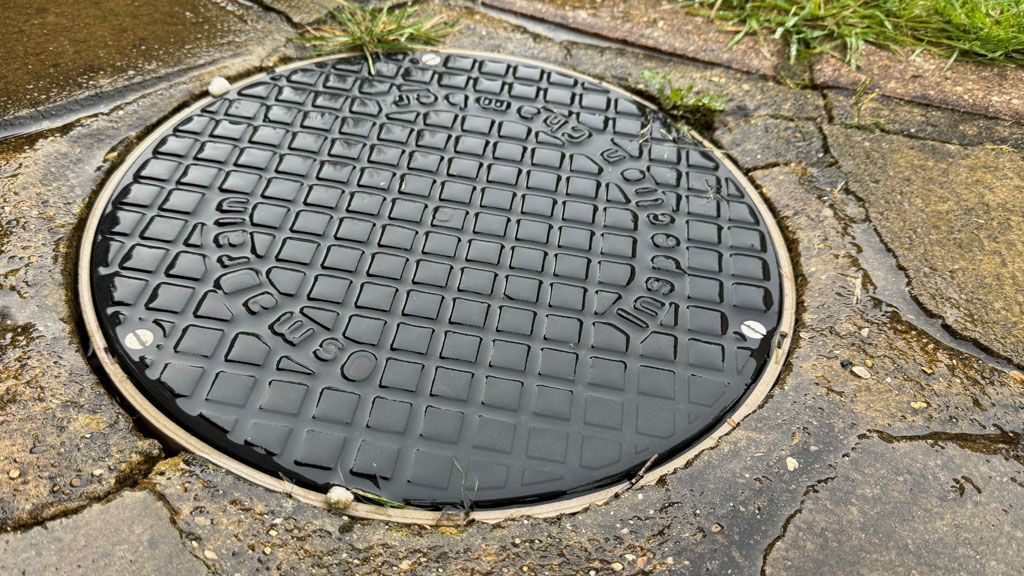 A clean drain which is still wet