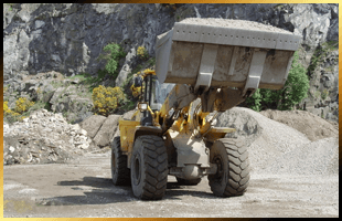 Tipper moving some aggregates around a quarry