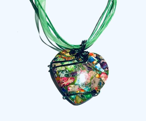 Green glass wire wrapped heart pendant