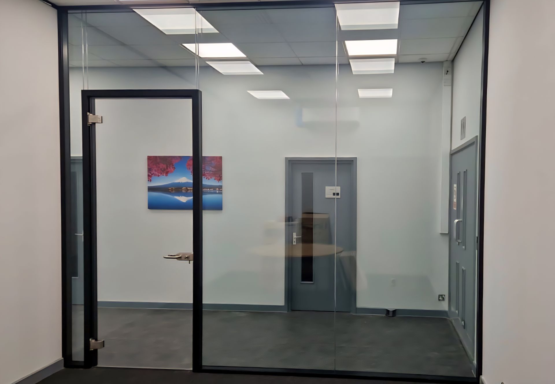 Double glazed glass partition incorporating glass doors and double glazed glass overpanels in Sunderland