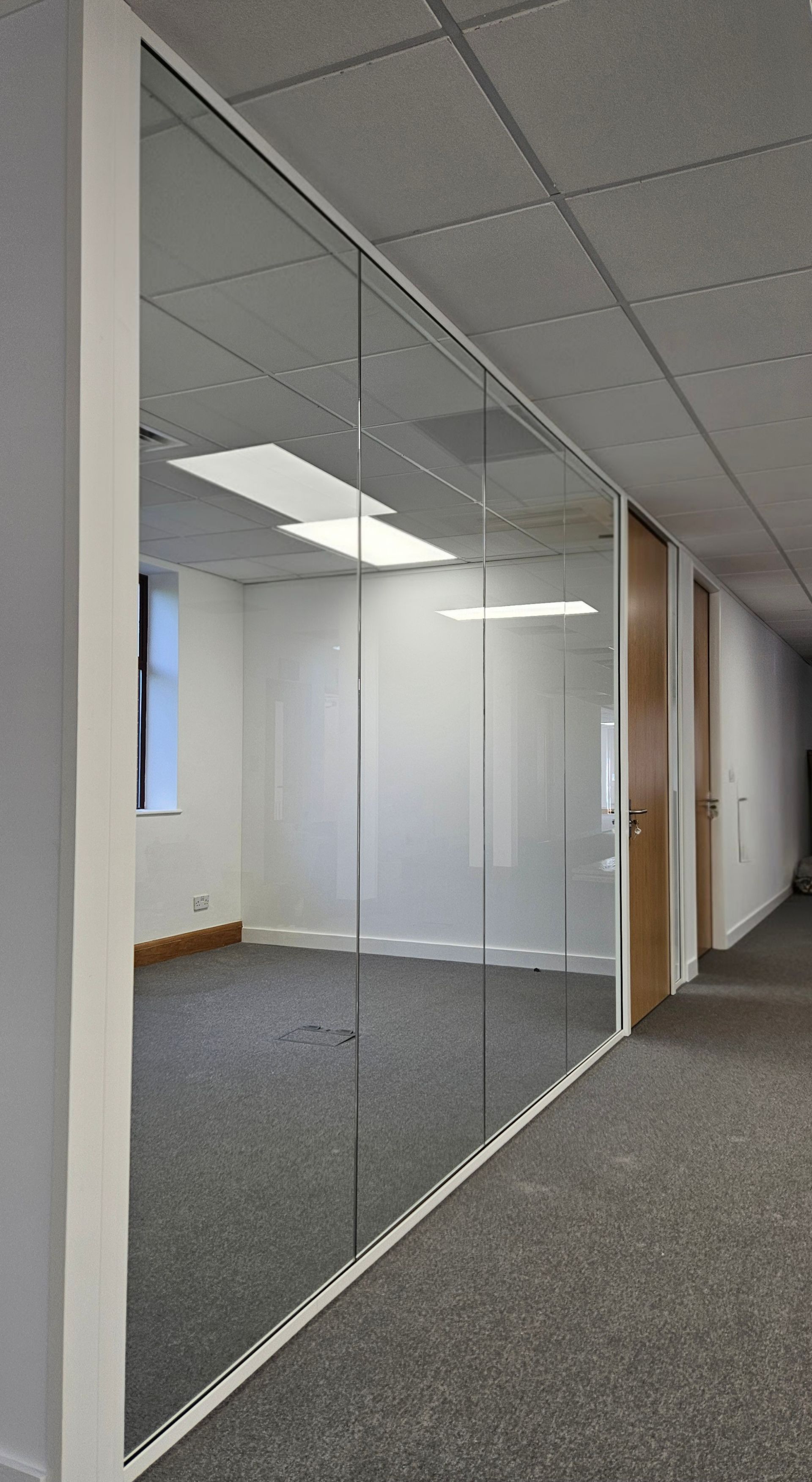 Single glazed office glass partitions in Sunderland with timber doors