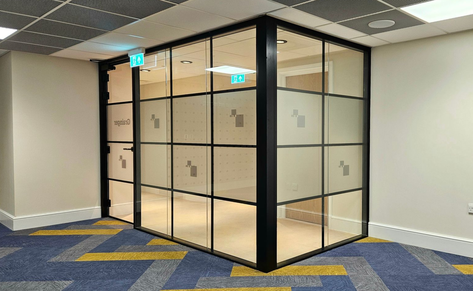 E30 (30/0) Aluminium Double Glazed Fire Screen with Single Door Set including Banded / Crittall Style Bars in Newcastle City Centre.