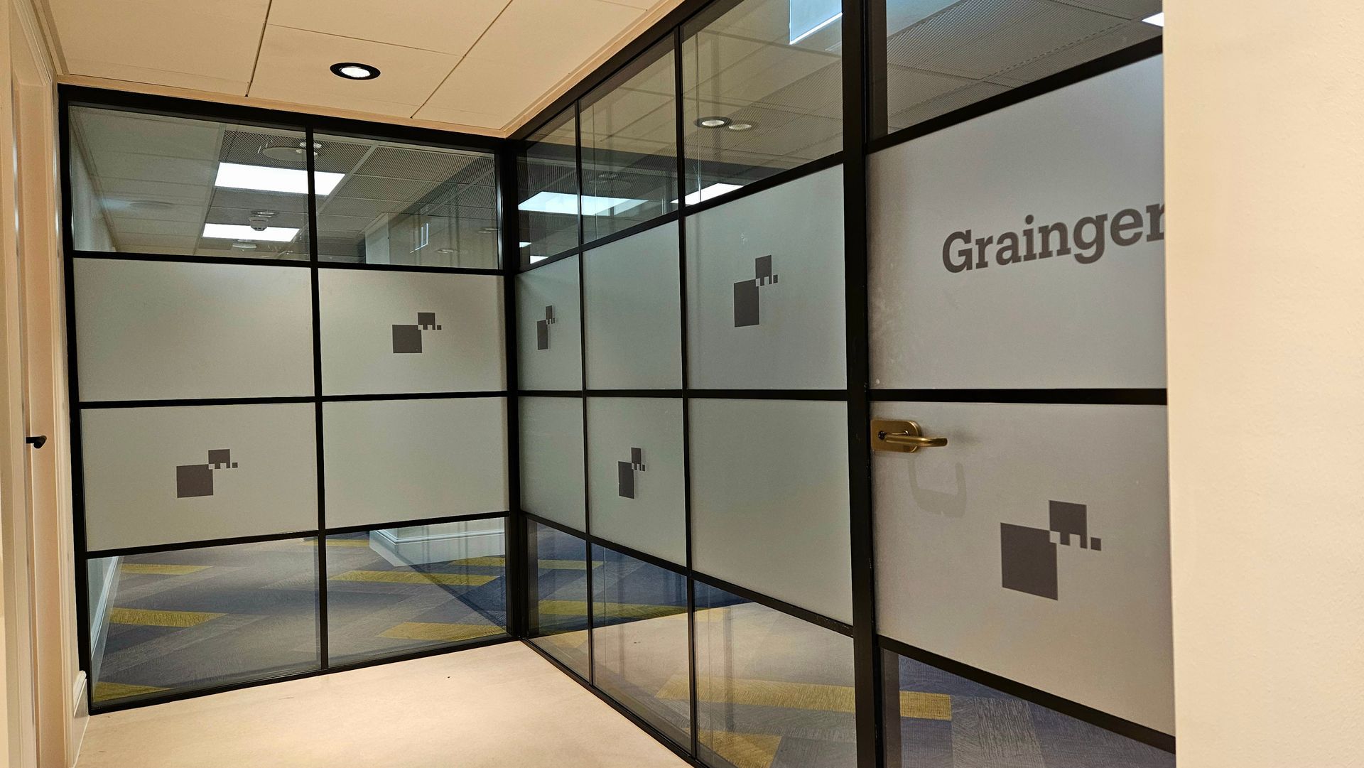 30 minute (E30) fire rated glass office partition with crittall style banding installed in Newcastle city centre 