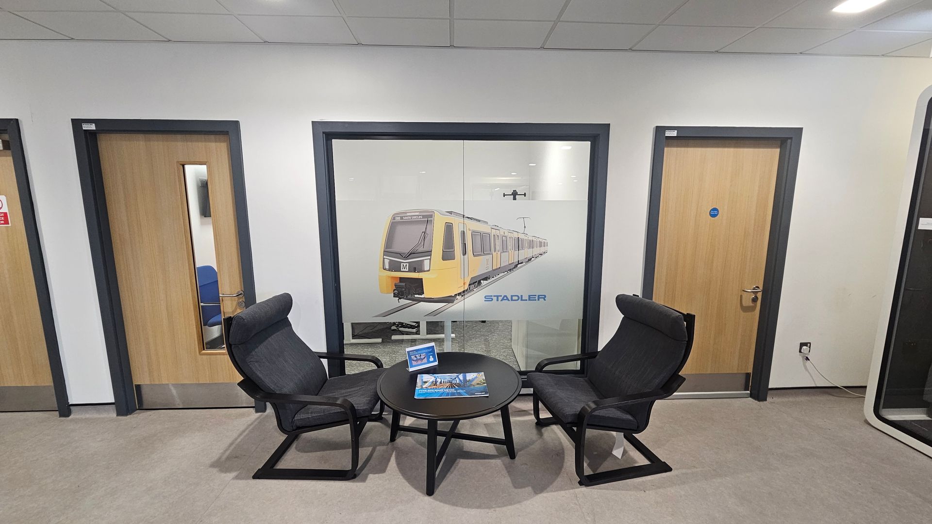 Aluminium fire screen with unique glass manifestation by Clear Divide Glass Partitions