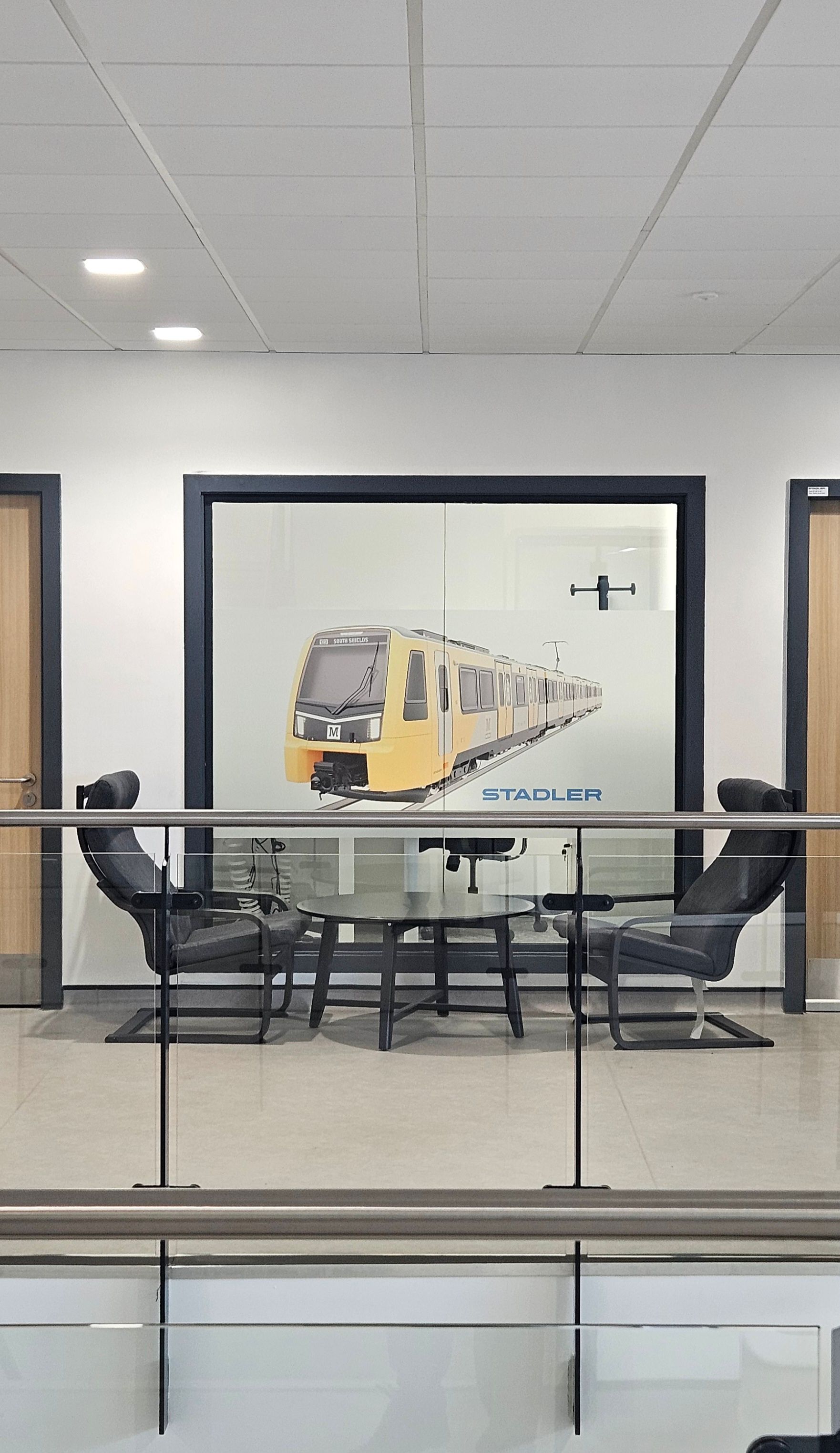 E30 fire rated glass partition with bespoke manifestation design in Newcastle upon Tyne