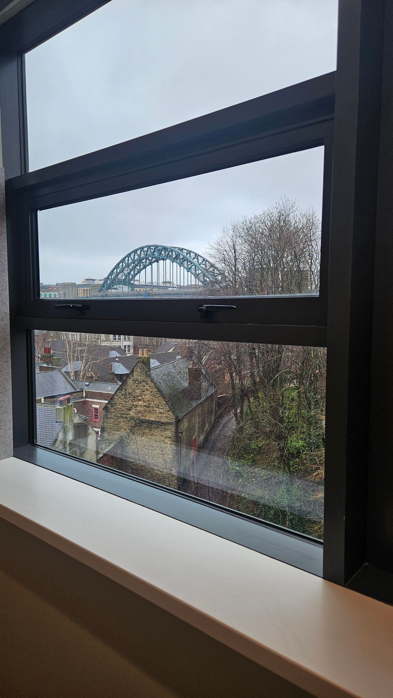 Office glass partition installation overlooking Tyne Bridge
