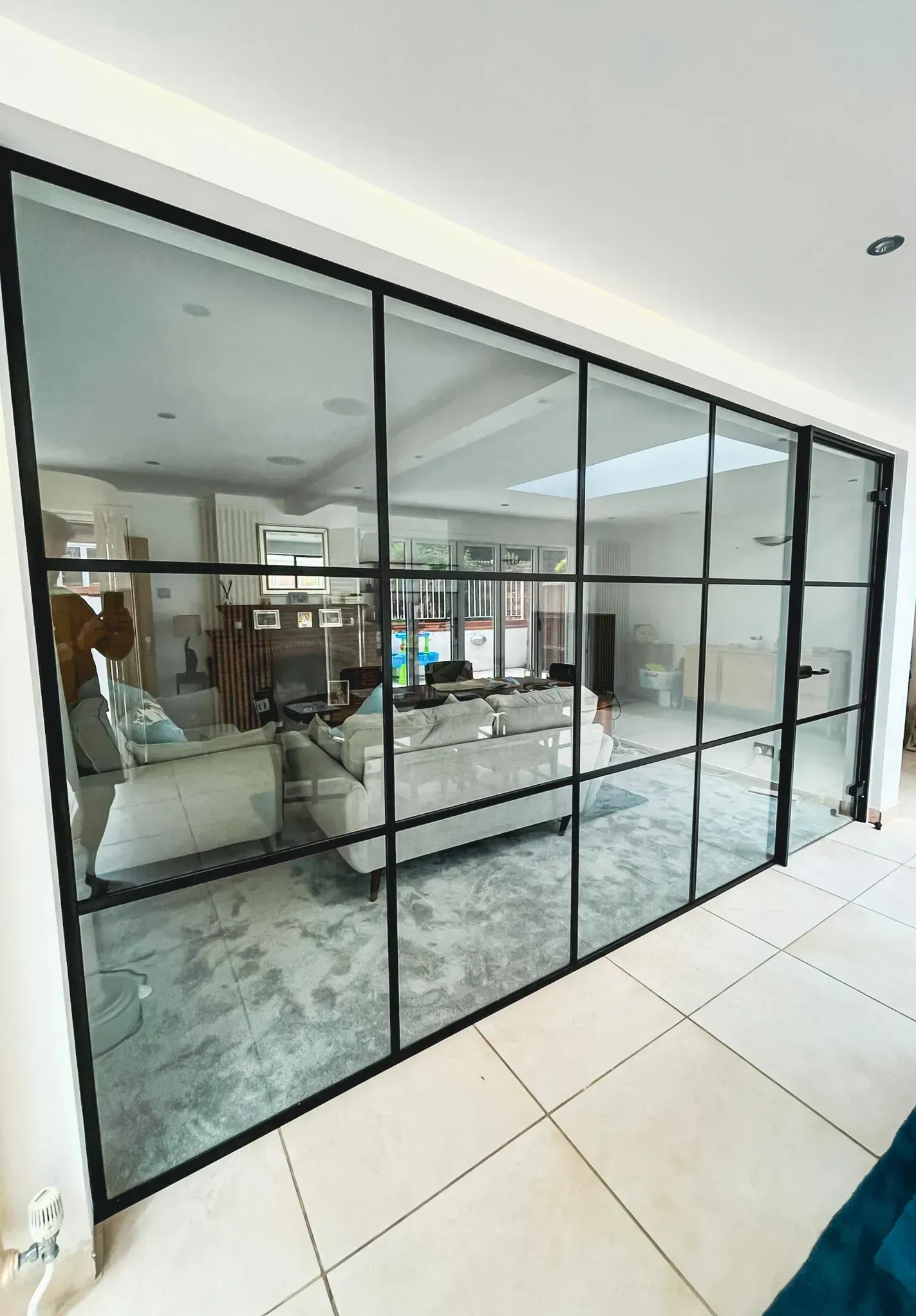 Aluminium Crittall / Banded Glass Wall & Door in to a Home Living Room, enhancing both Privacy & Light Flow