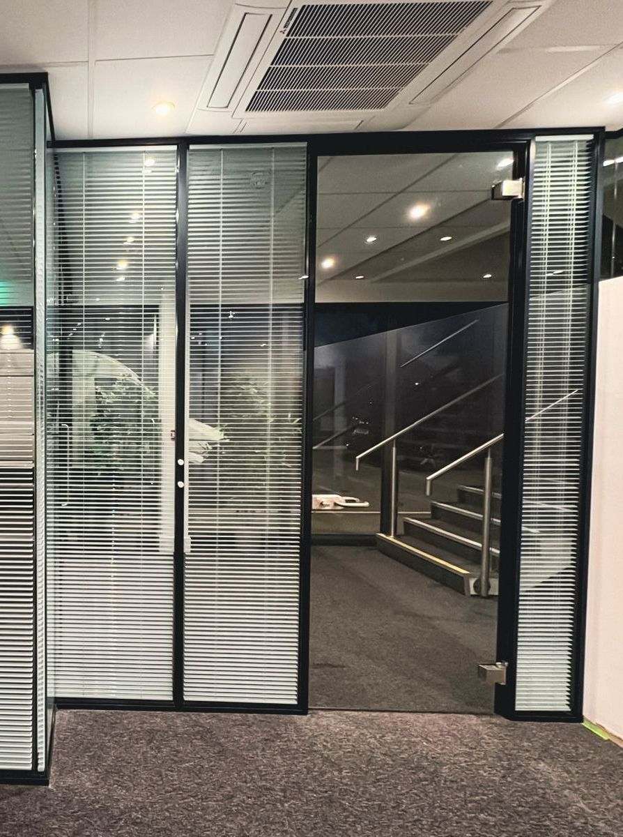 Double Glazed Glass Partition including Integral Blinds and Glass Door