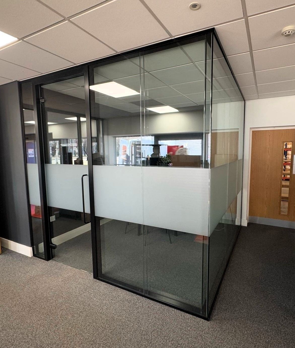 Double Glazed Office Glass Partition with black frame including Glass Door for a commercial project in Newcastle upon Tyne 