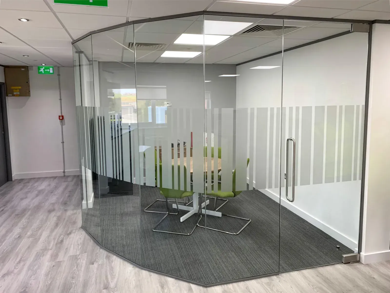 Faceted Office Glass Partition including Frameless Glass Door