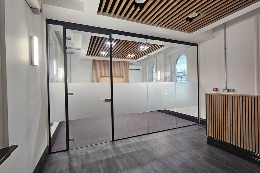 Glass office partition installed in Newcastle Central Station, by Clear Divide