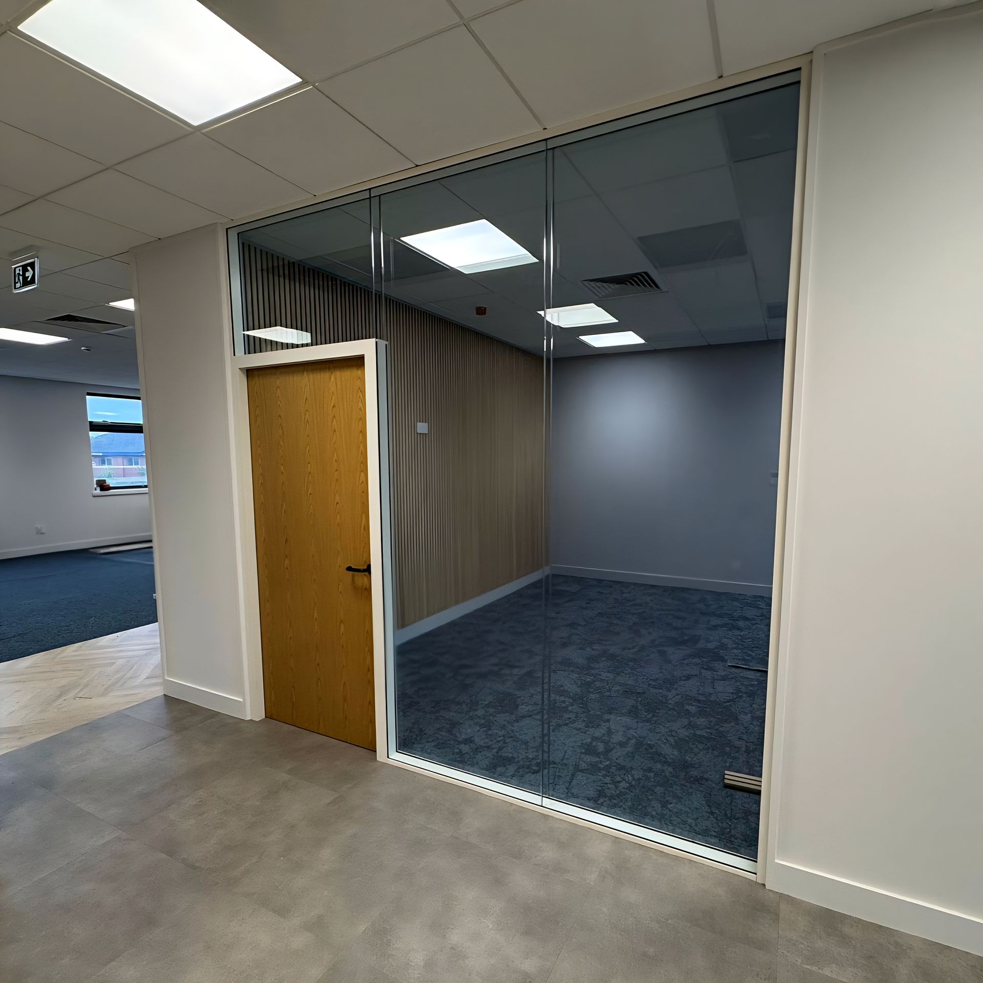 Double glazed glass office partitions with oak framed flush doors in Stockton, Teesside