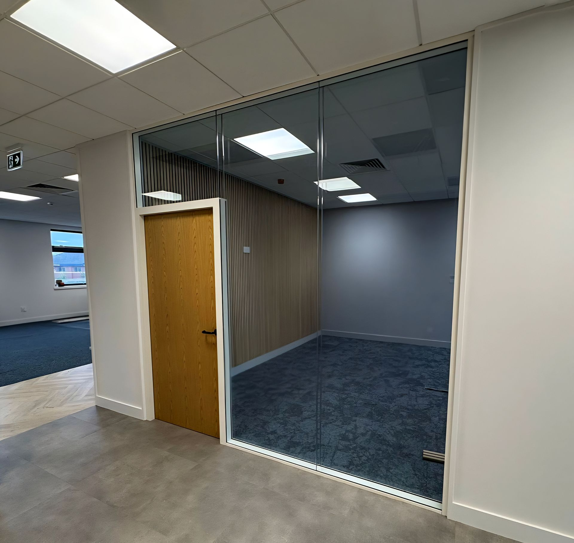Double glazed glass office partitions with oak framed flush doors in Stockton, Teesside