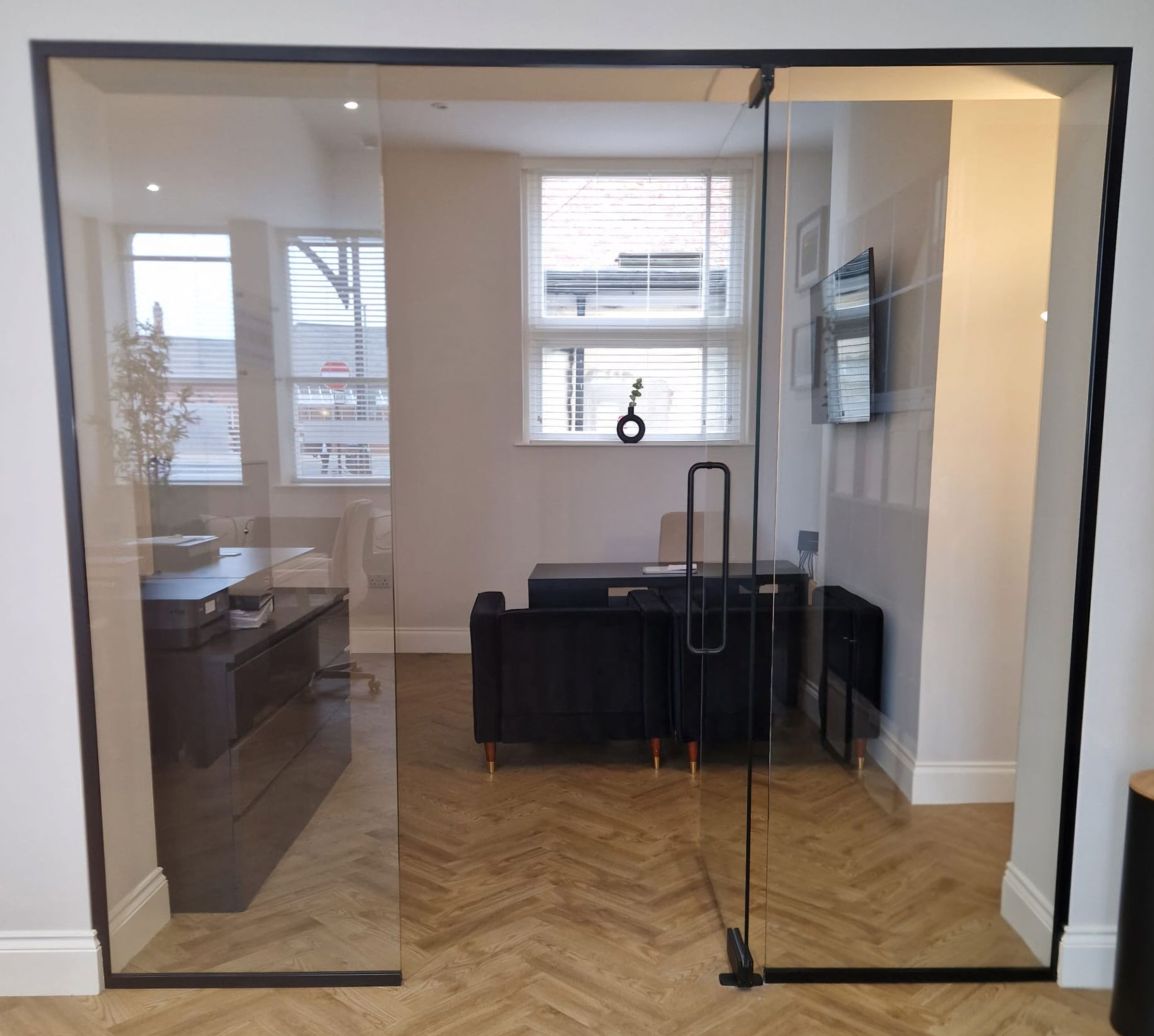 Frameless glass office partition installation in Hartlepool Teesside 