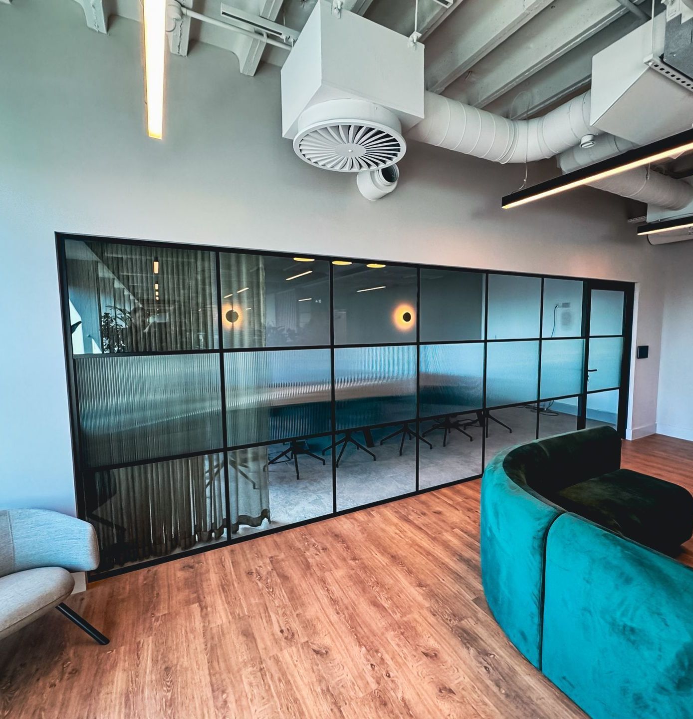 Banded Industrial Office Glass Partition with Reeded Manifestation including an Acoustic Glass Door