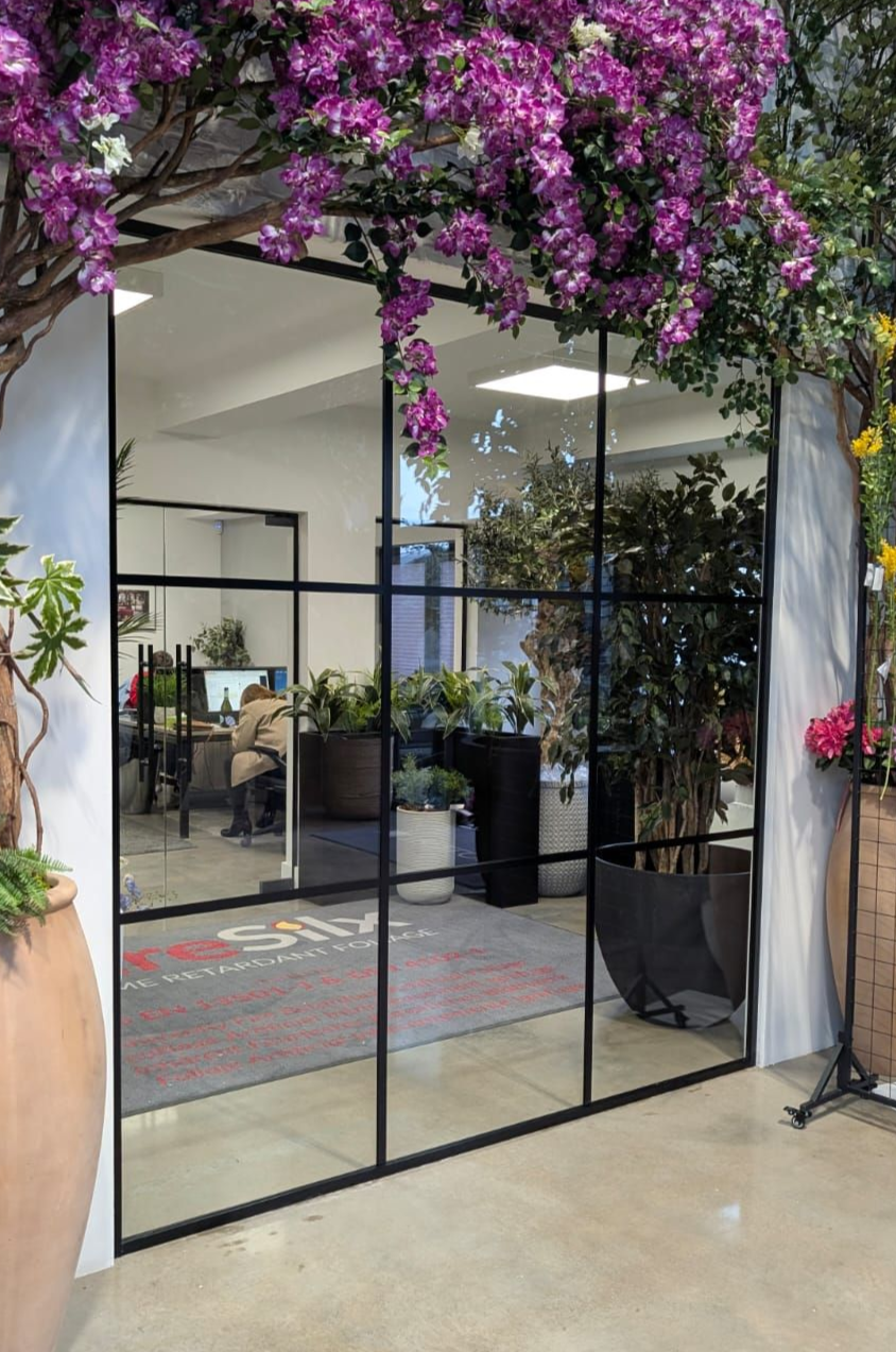 Clear Divide installed an Industrial glass partition with black banding detail