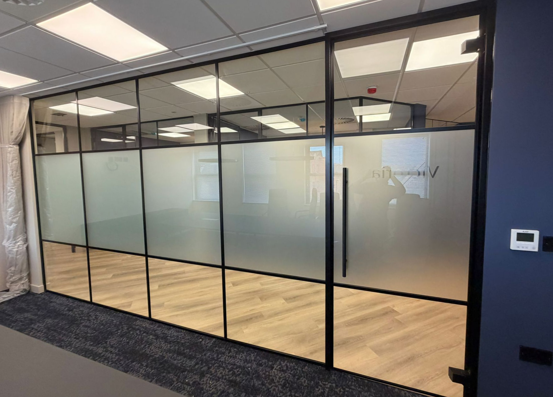Crittall style glass office partitions installed by Clear Divide Glass Partitions 