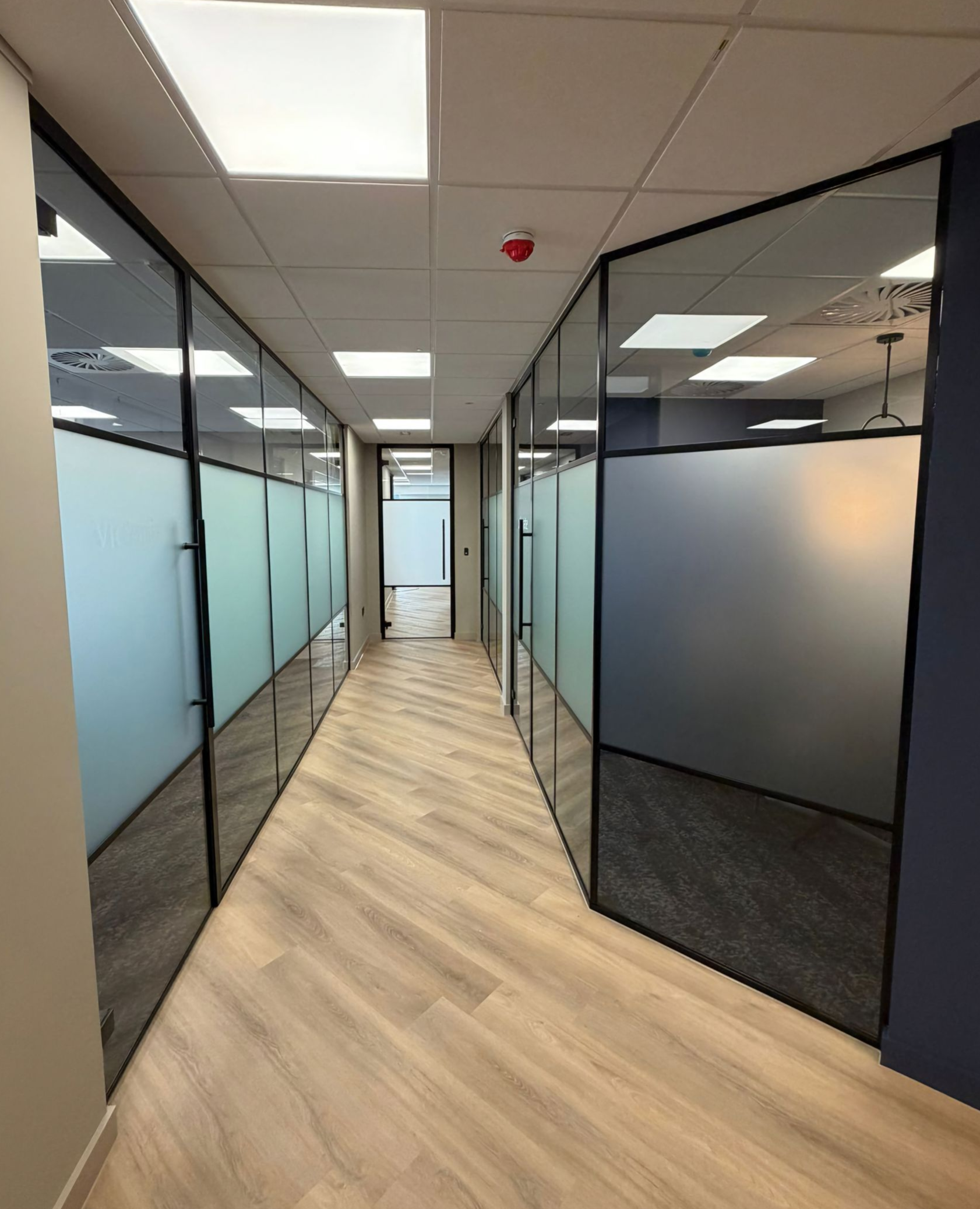 Crittall style glass office partitions installed in Winchester by Clear Divide