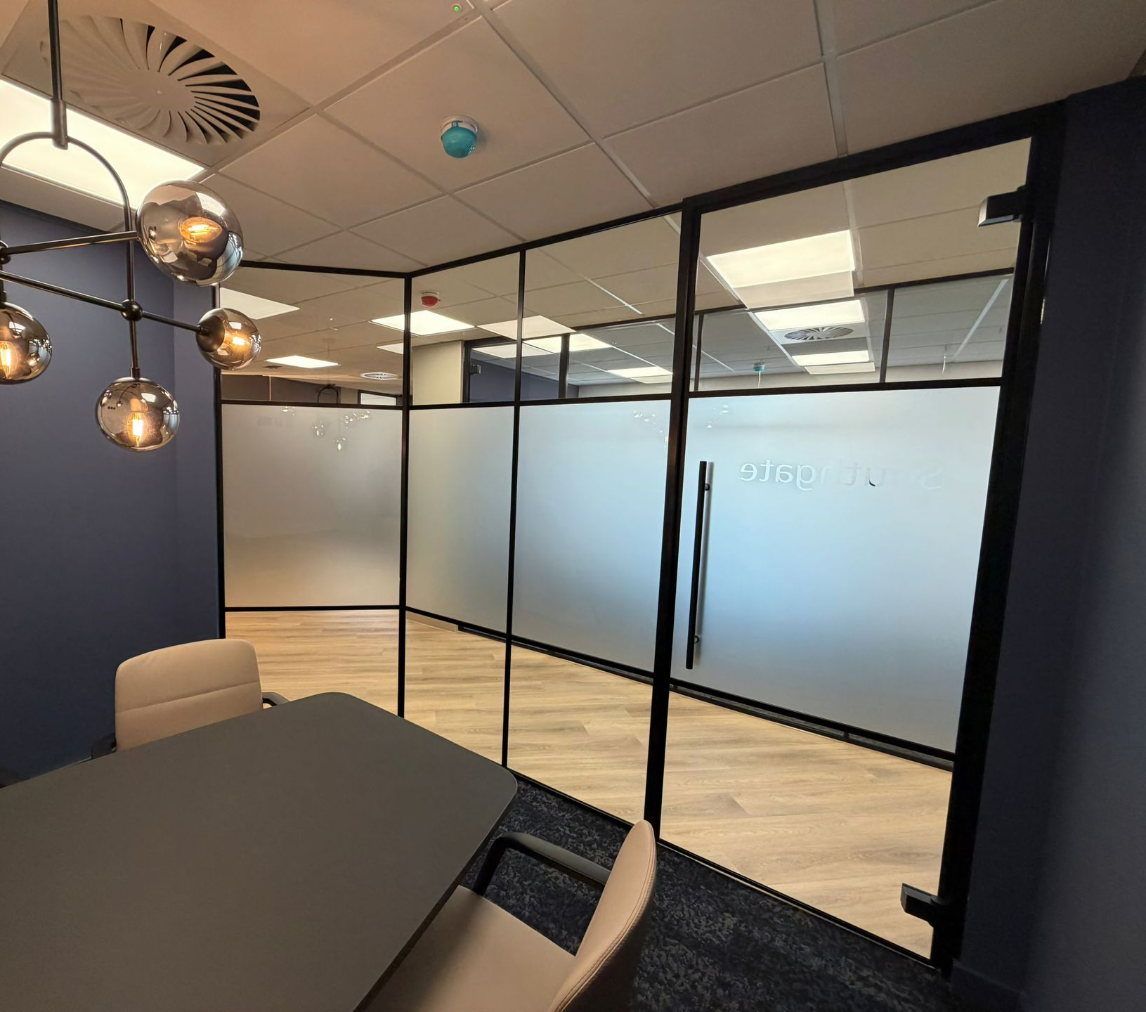 Acoustic crittall style glass office partitions installed in Winchester by Clear Divide