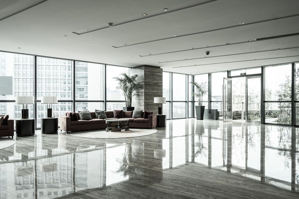 Inviting Living Room with Comfortable Couch and Table — NBM Constructions in Canberra