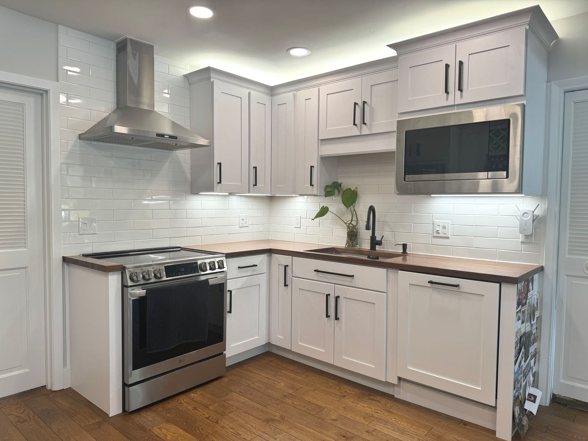 Kitchen Renovation with White Cabinets and Appliances