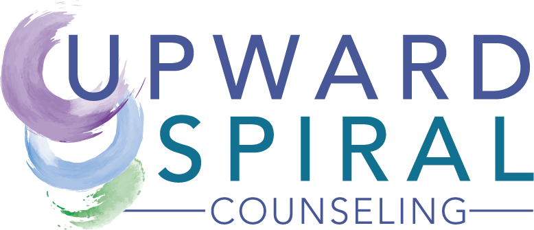 The logo for upward spiral counseling