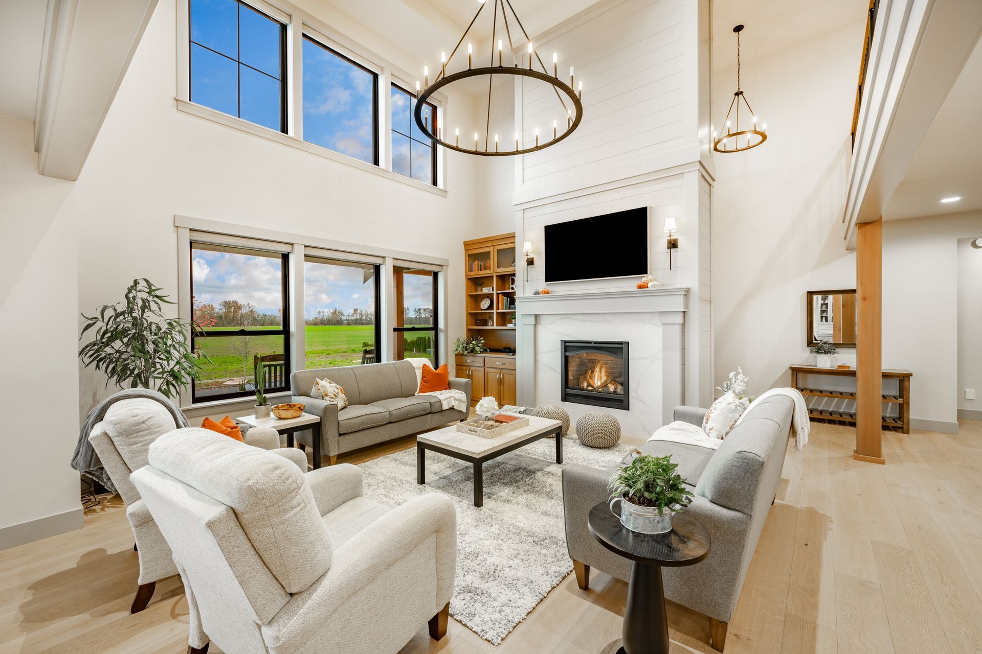 A living room filled with furniture and a fireplace.