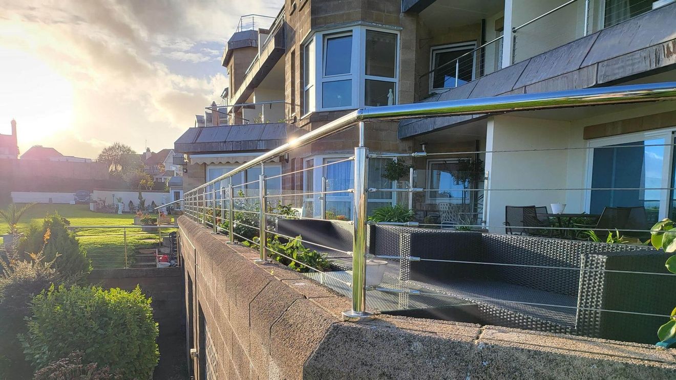 Frameless channel glass balustrade system installed by Swansea Glass Balustrades in Hendrefoilan property.