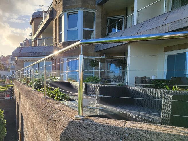 Frameless channel glass balustrade system installed by Swansea Glass Balustrades in Hendrefoilan property.