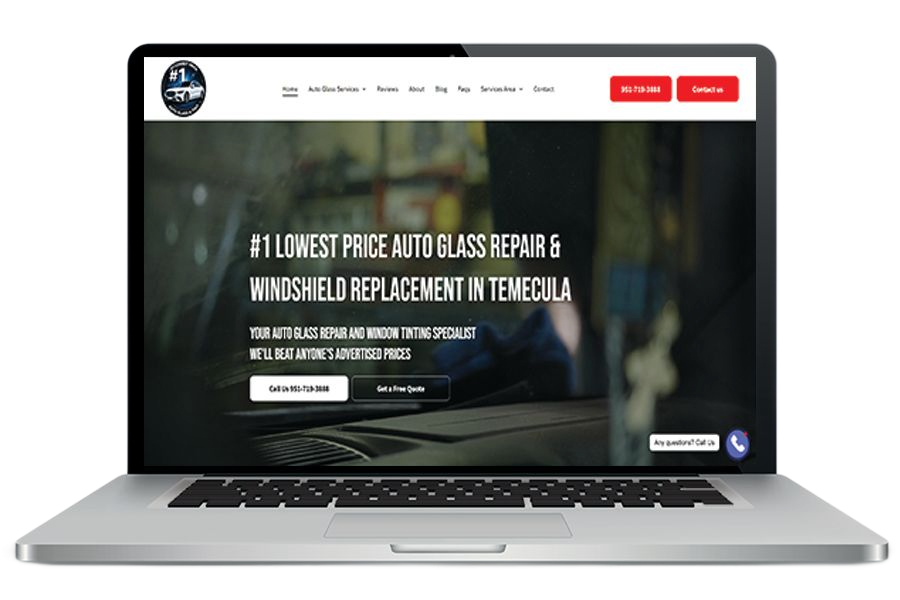 Laptop displaying a website for auto glass repair and windshield replacement services in Knoxville, tn