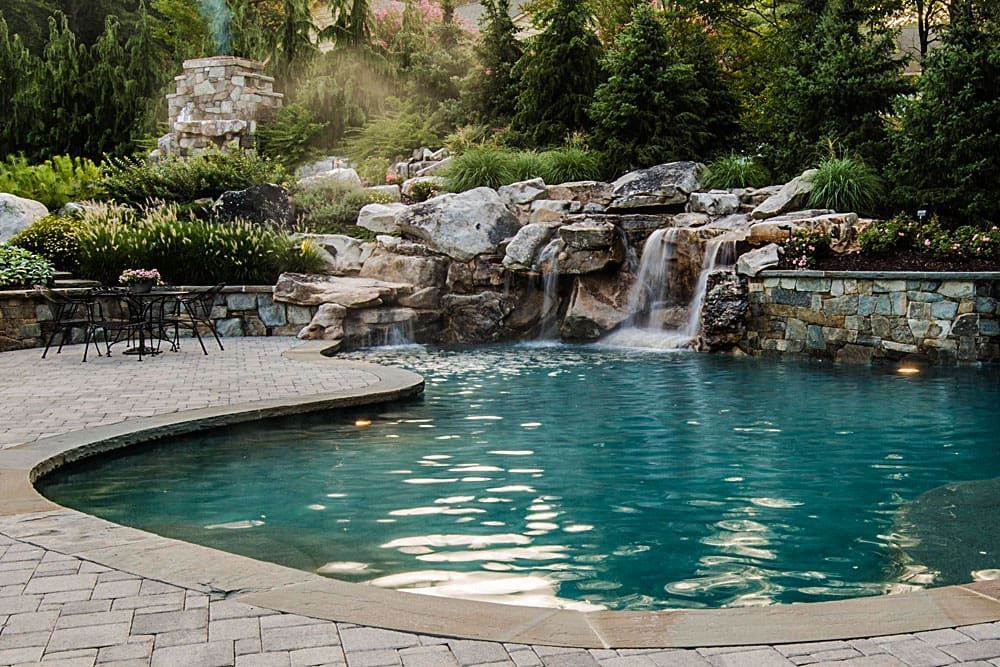 Multi-level pool with cascading waterfalls