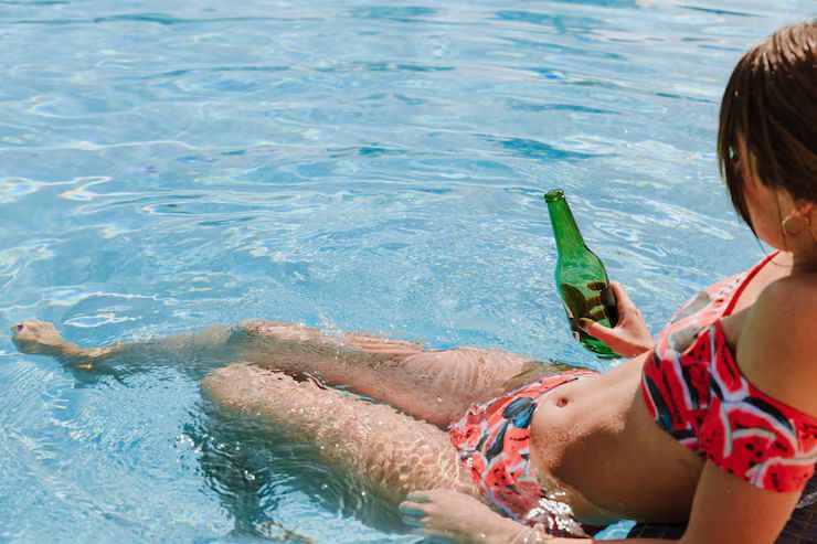 woman relaxing swimming pool