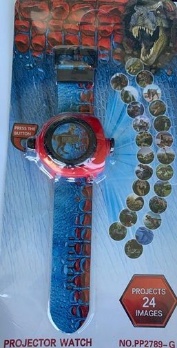 Een projectorhorloge met een afbeelding van een dinosaurus erop.