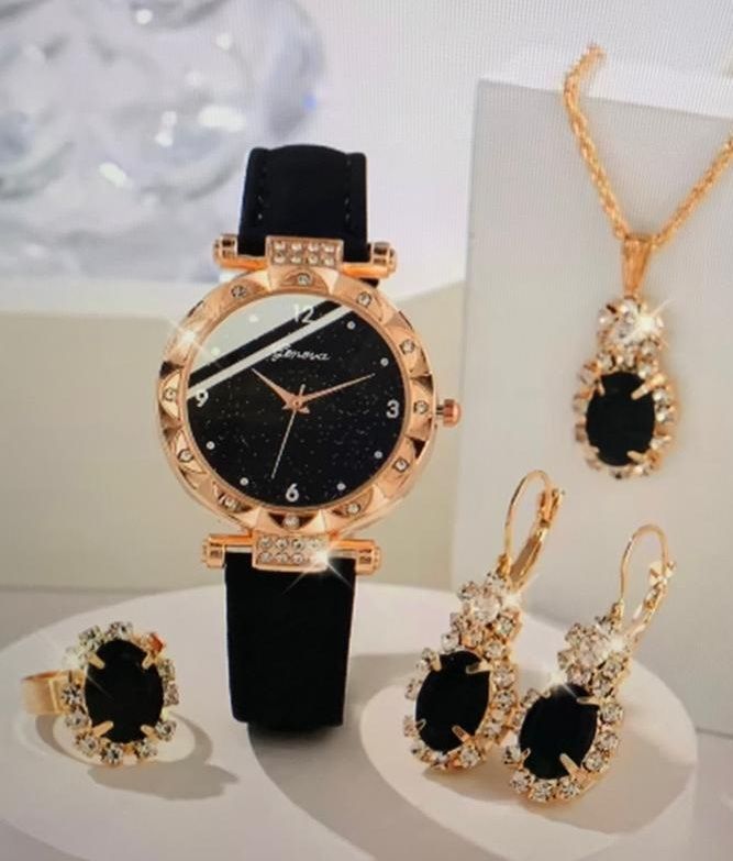 Een set sieraden bestaande uit een horloge en oorbellen