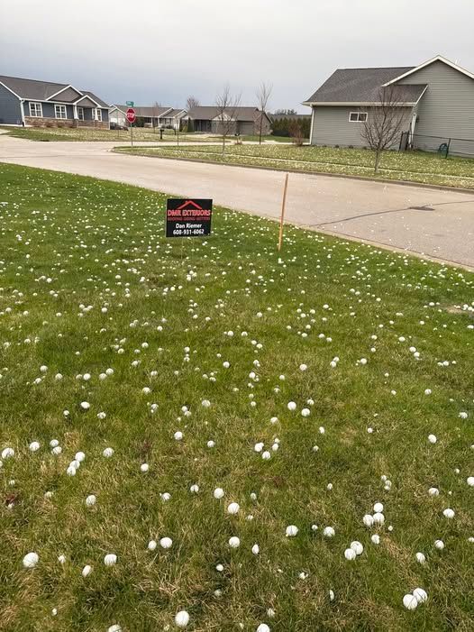 Hail sitting in a lawn in Evansville, Wisconsin