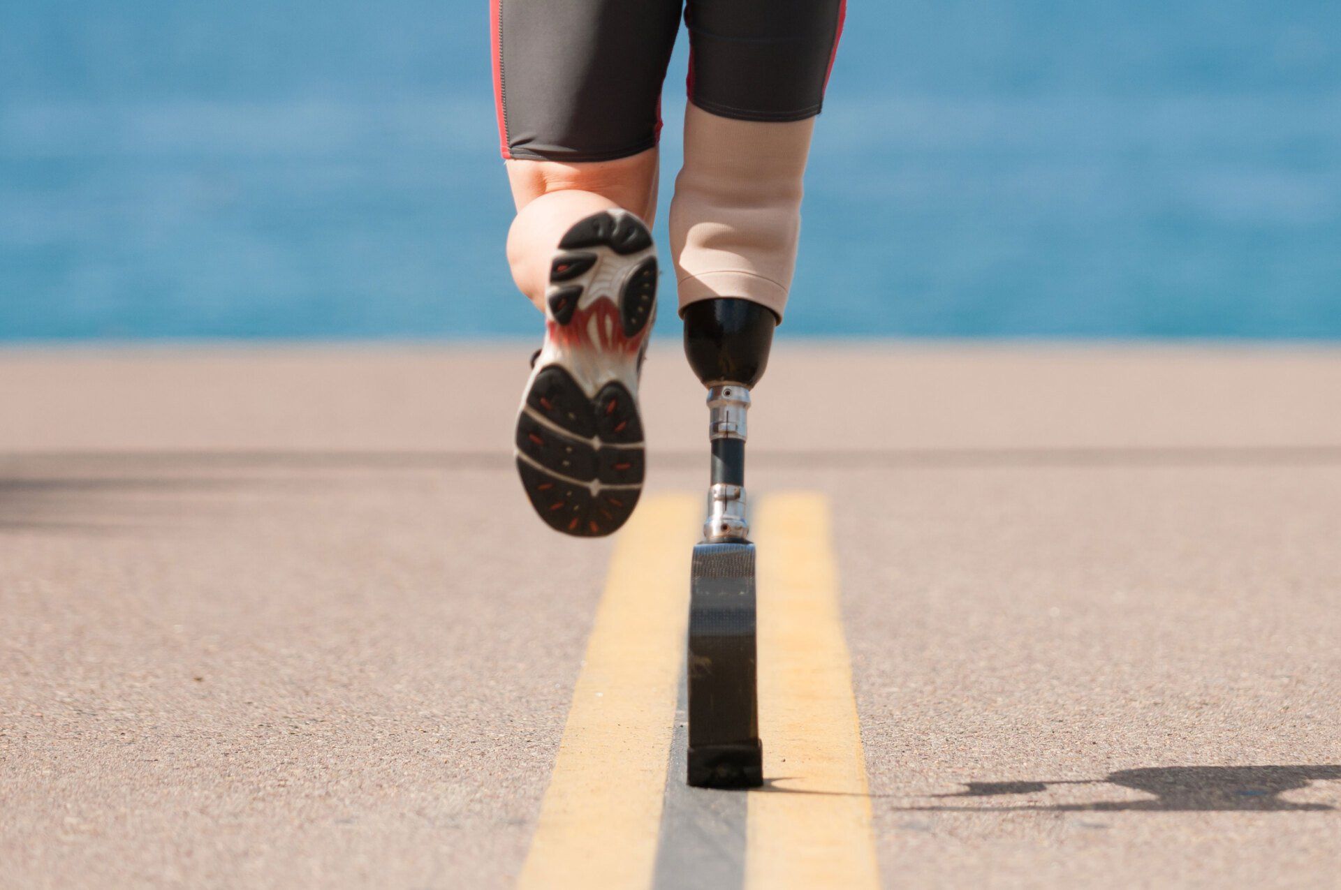 Running man with prosthetics — Fayetteville, NC — Total Rehab Orthotics & Prosthetics