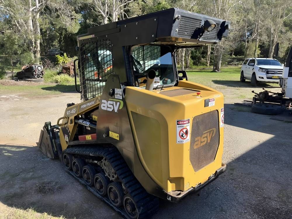 A Yellow Bulldozer is Parked in a Parking Lot — Byron Earth & Road in Wardell, NSW