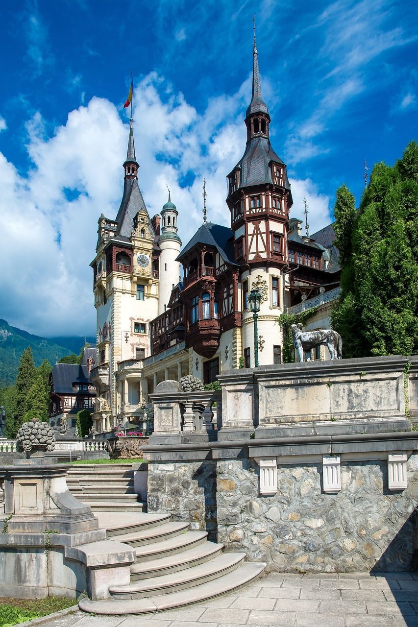 A large castle with stairs leading up to it