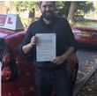 Happy student after passing the driving test through our intensive course