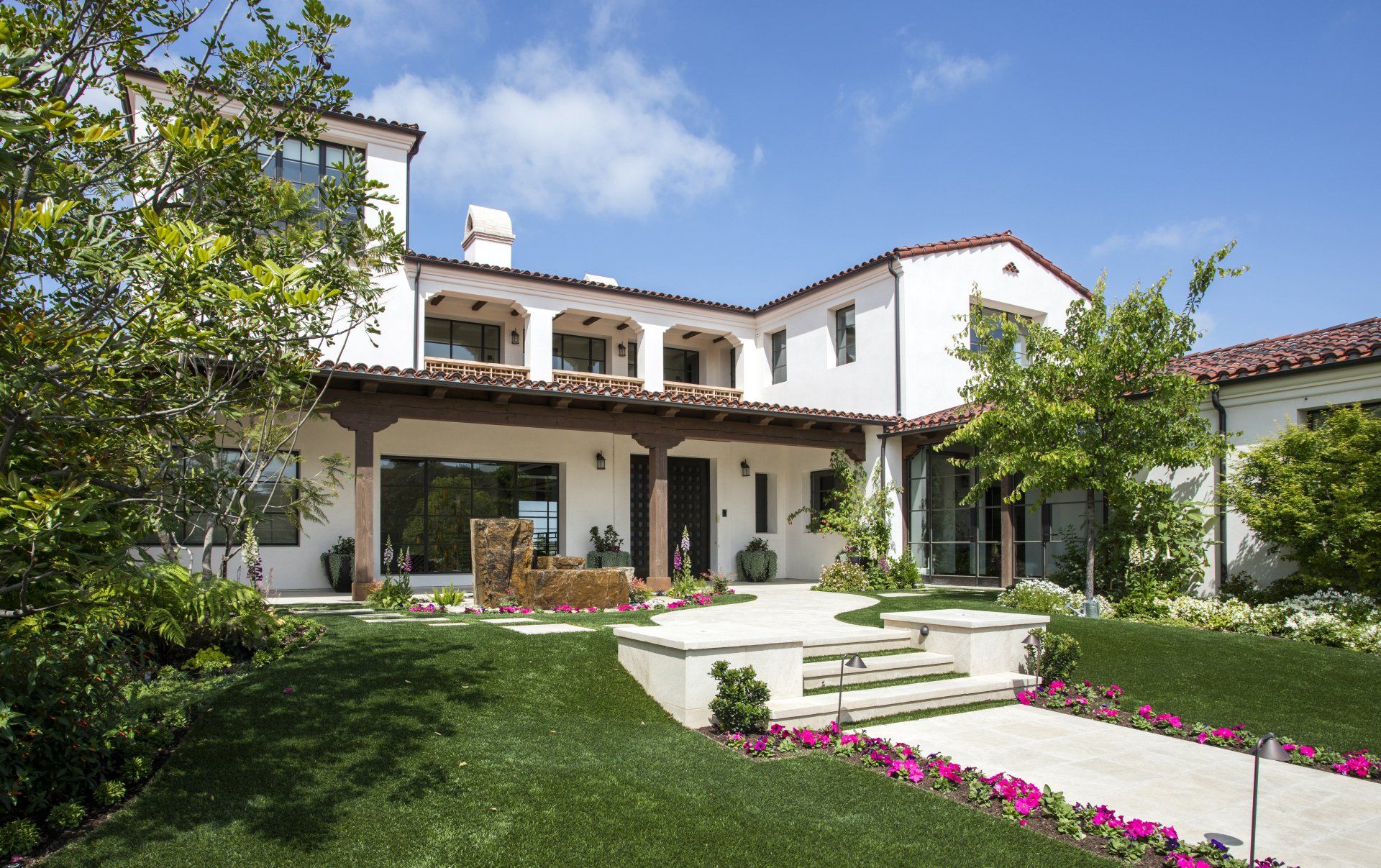 Exterior of a Santa Barbara style home in Irvine designed by Oatman Architects