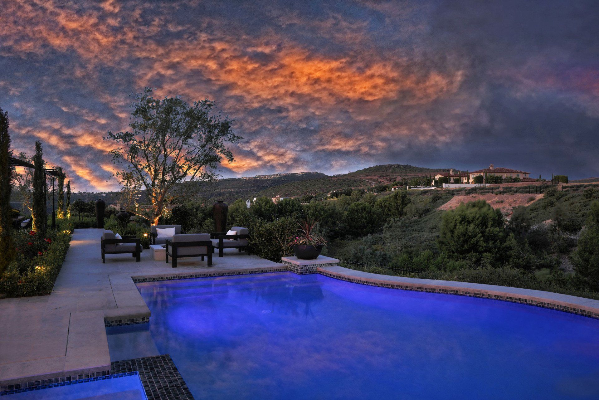 image of the pool at a formal Italian style home in Crystal Cove designed by Oatman Architects