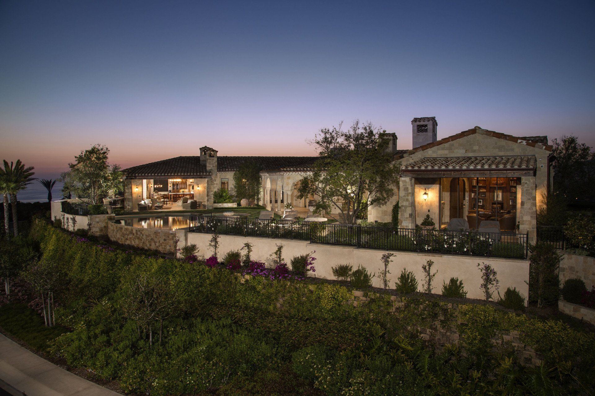 Exterior of a ROMANESQUE HILLTOP VILLA in Dana Point designed by Oatman Architects