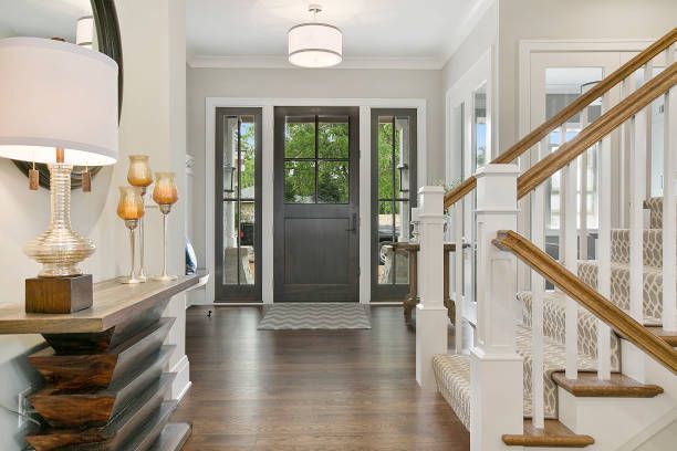 Front door of a home with a beautiful floor plan design.