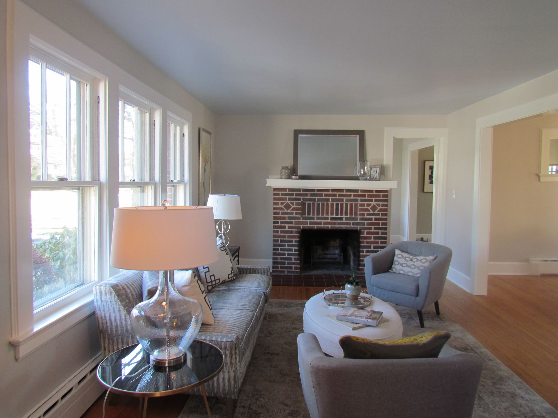 A living room with a fireplace and a couch