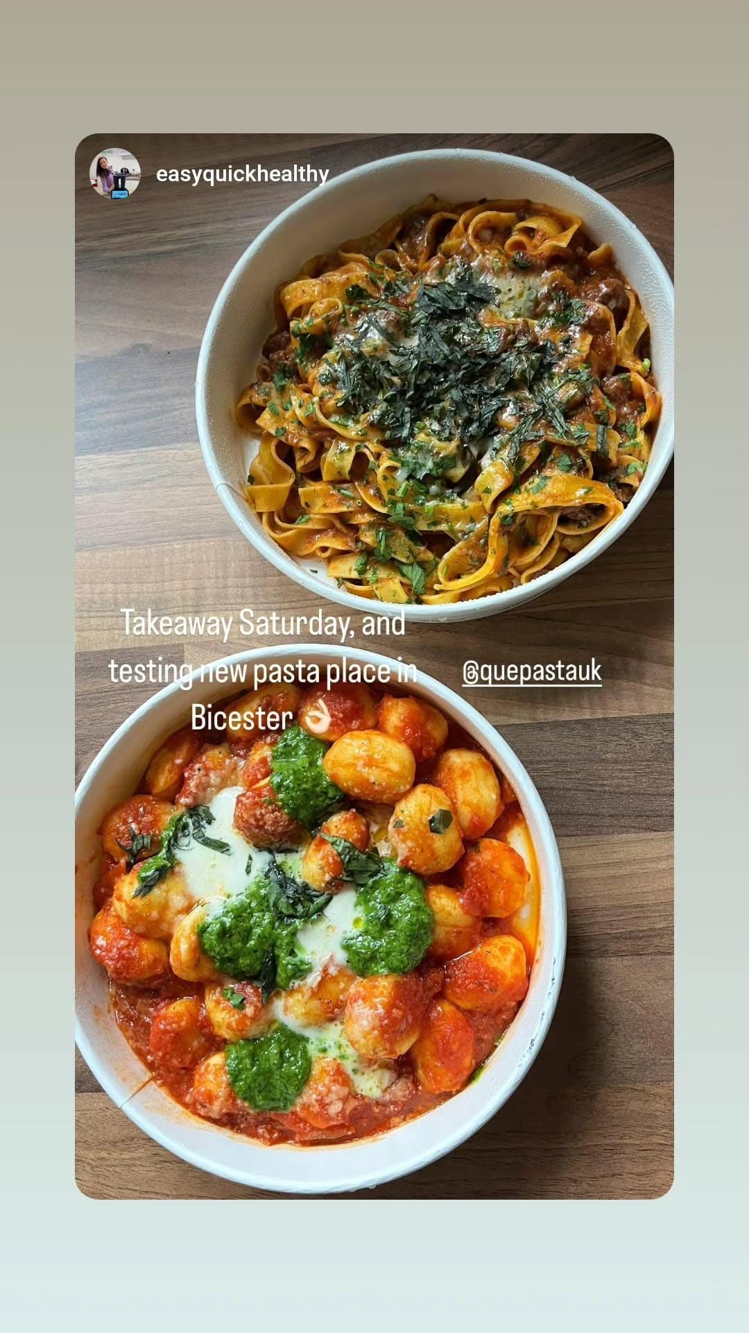 Two bowls of food are sitting on a wooden table.