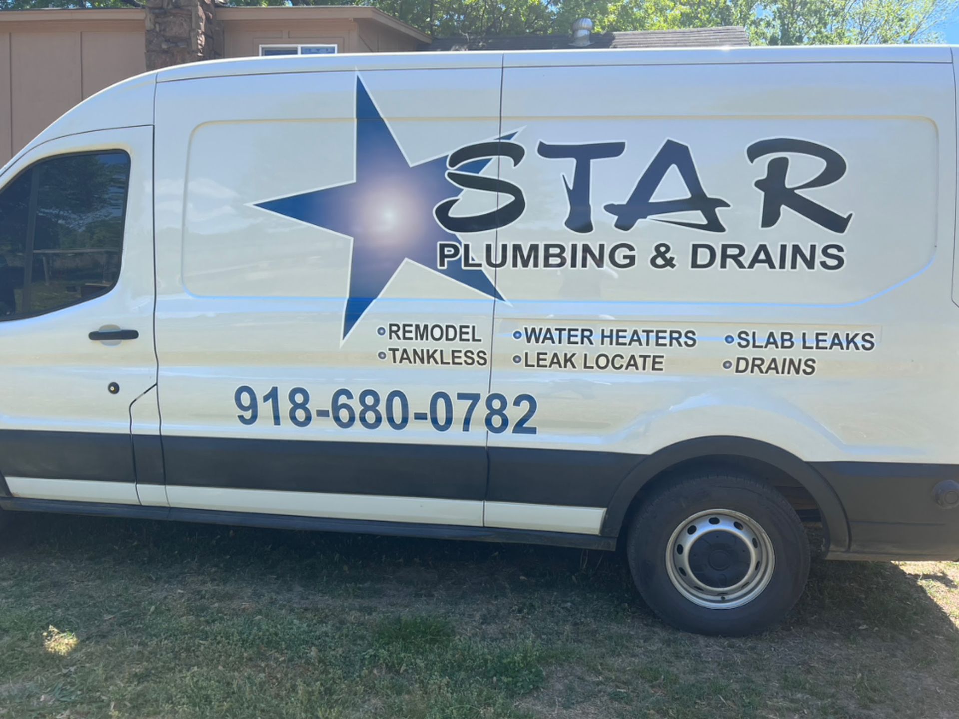 White plumbing van with 