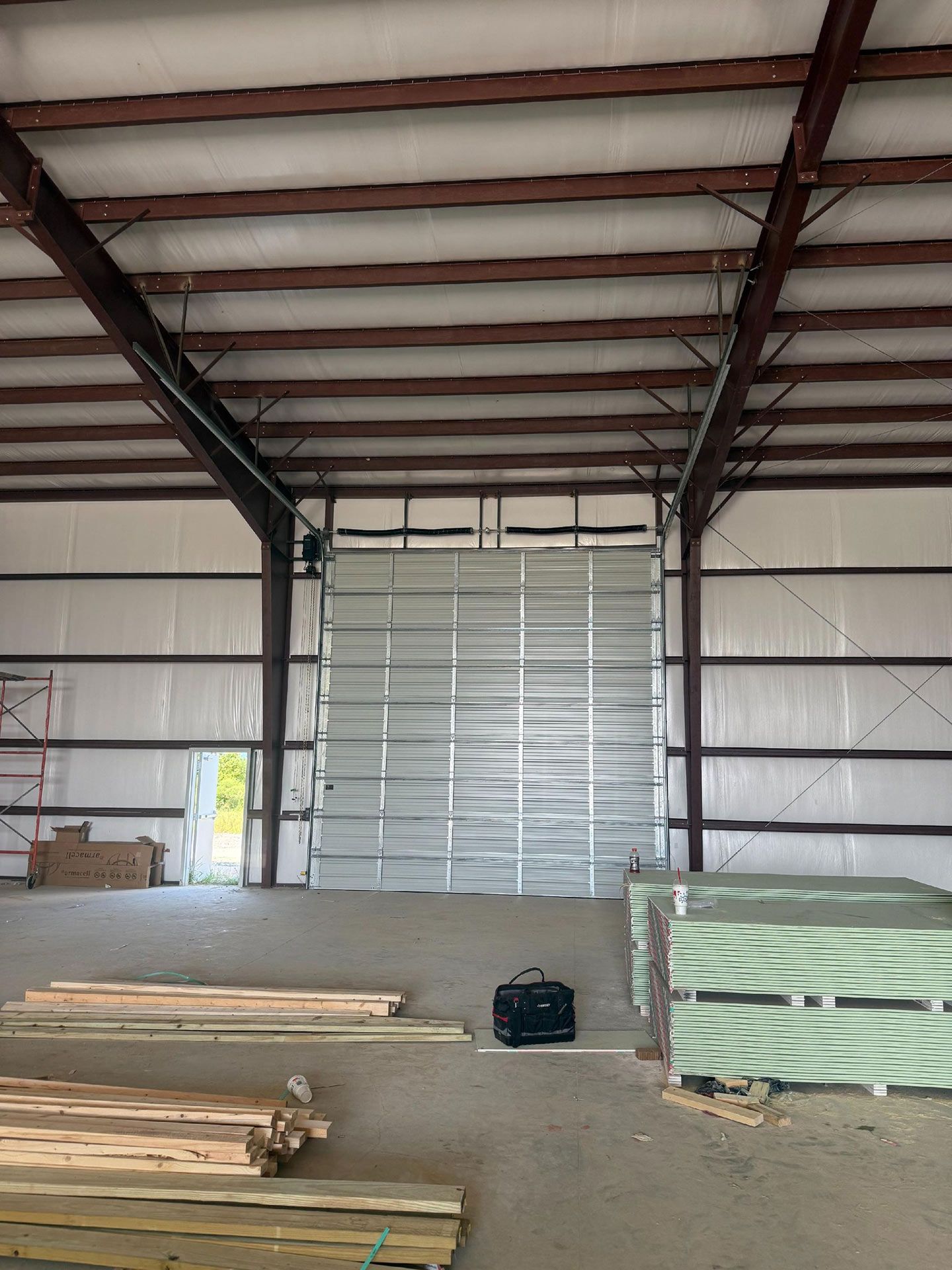 Garage Door and Interior of a Large Warehouse