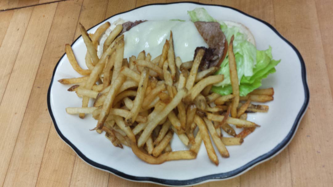 Delmonico Steak Sandwich with fresh cut French fries - Food Services in Virginia Beach, VA