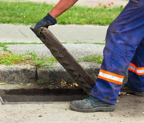 Sewer Line Inspection — Plumber Checking A Sewer In Eugene, OR