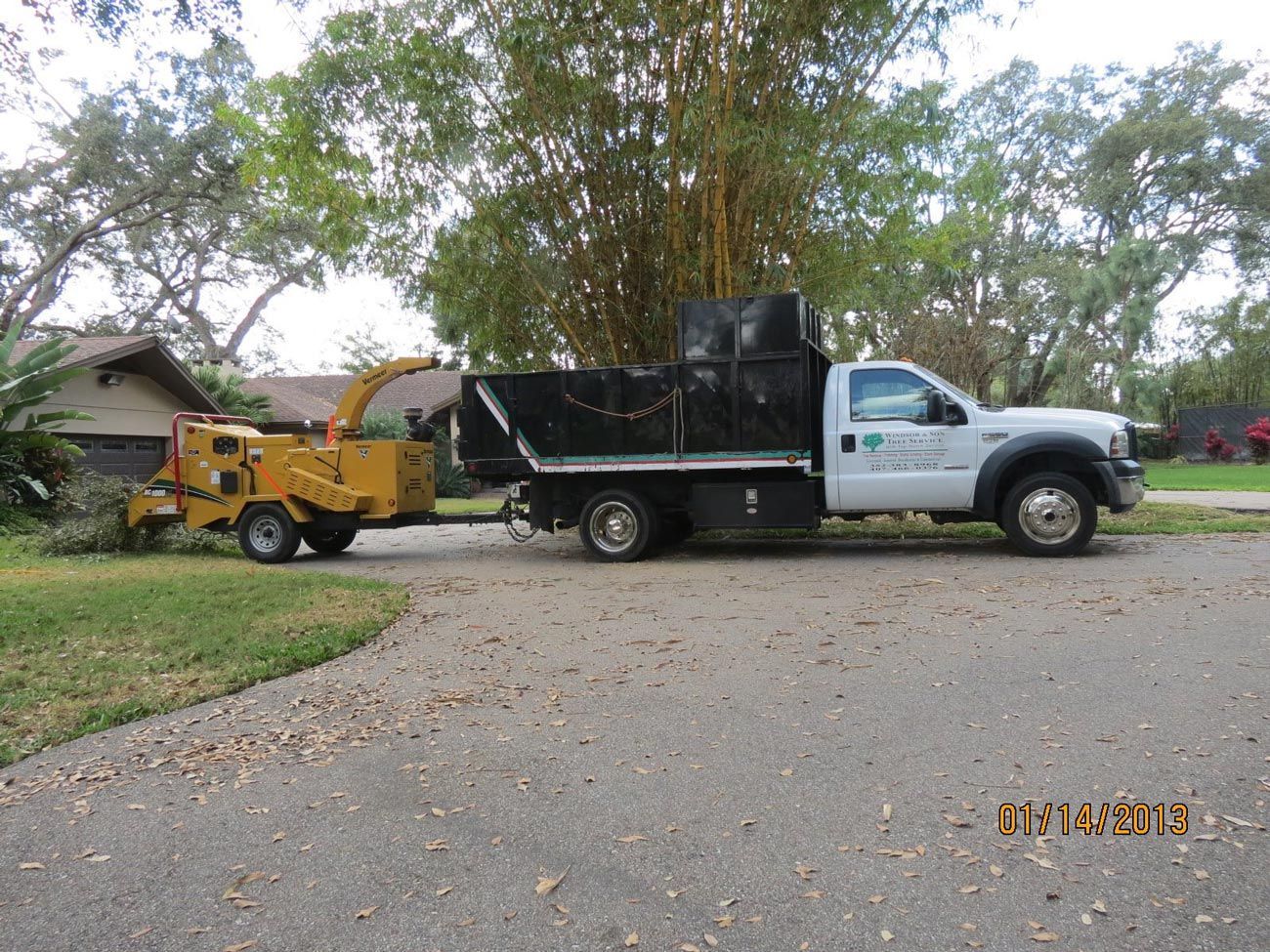 Wood Chipper And Truck — Sorrento, FL — Windsor & Son Tree Service